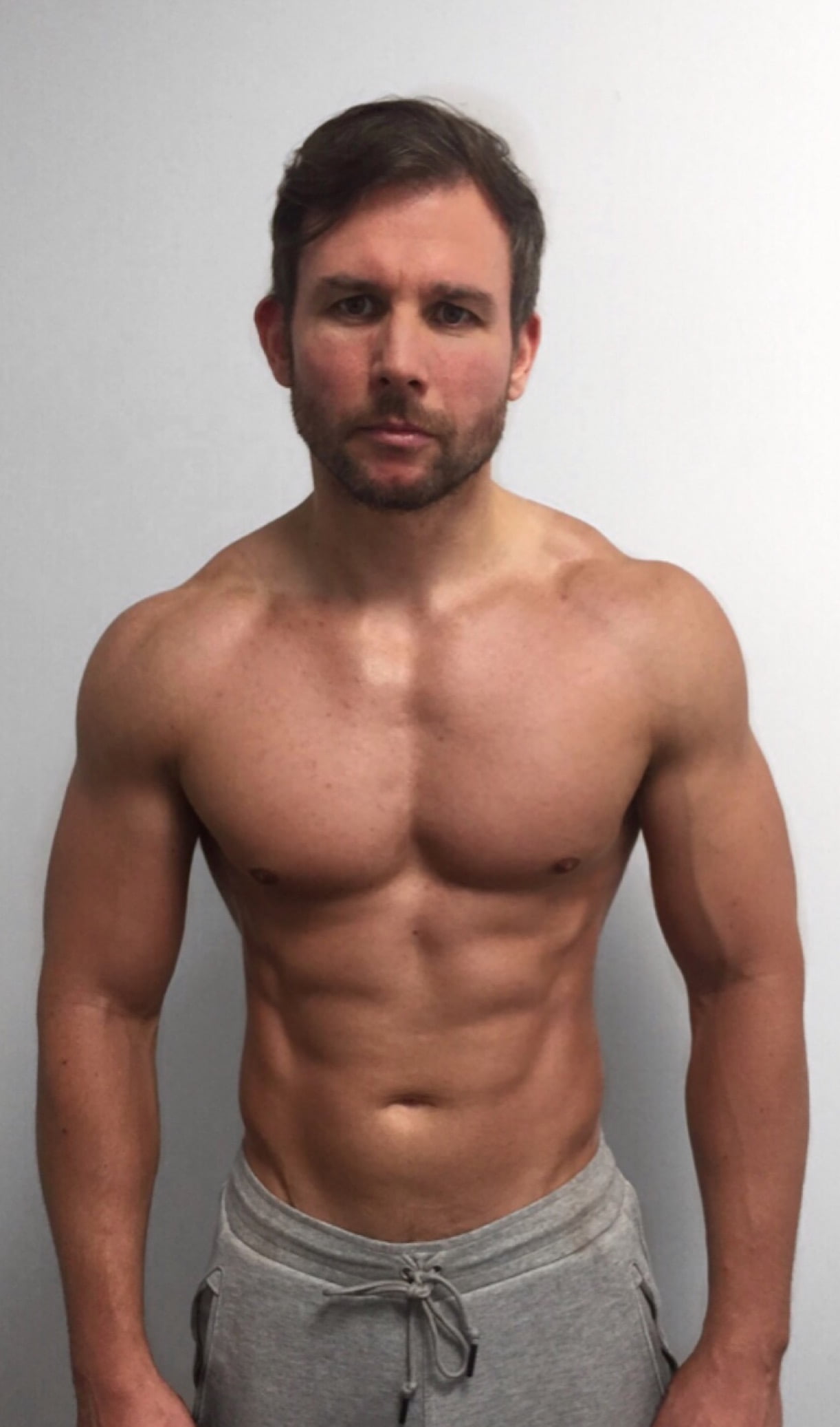 Male body transformation after photo with muscle definition at Roar Fitness
