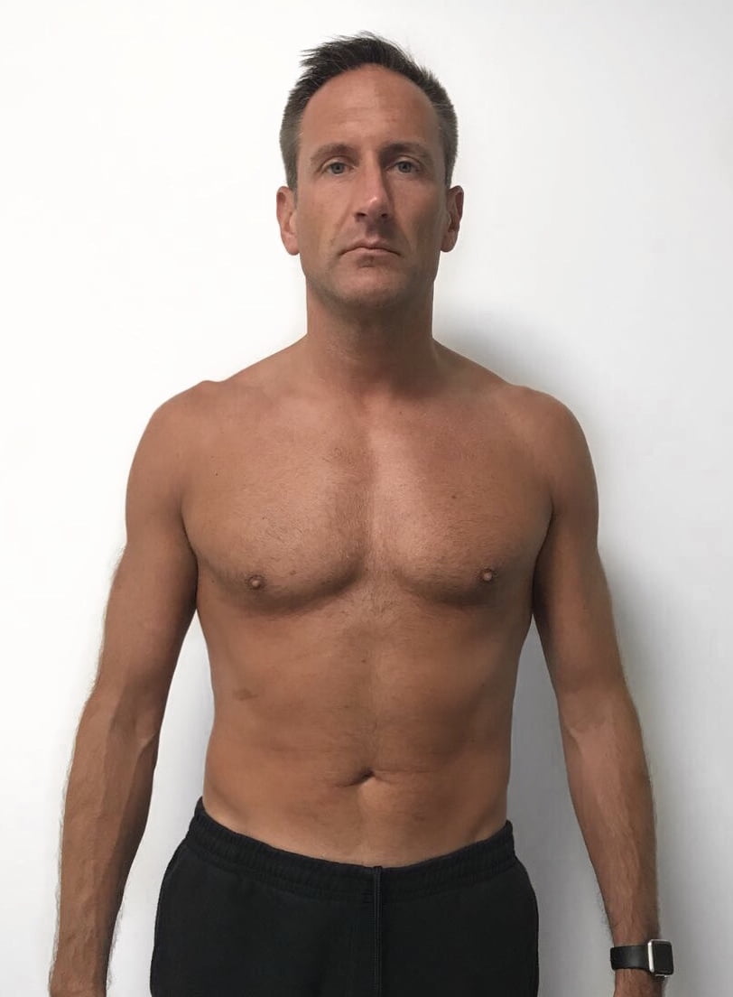 Male body transformation after photo showing muscle definition at Roar Fitness
