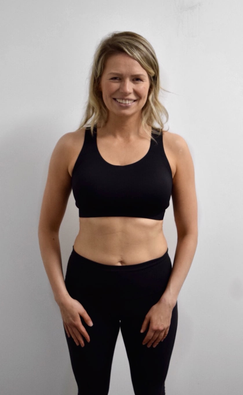 Female body transformation before photo at Roar Fitness London studio