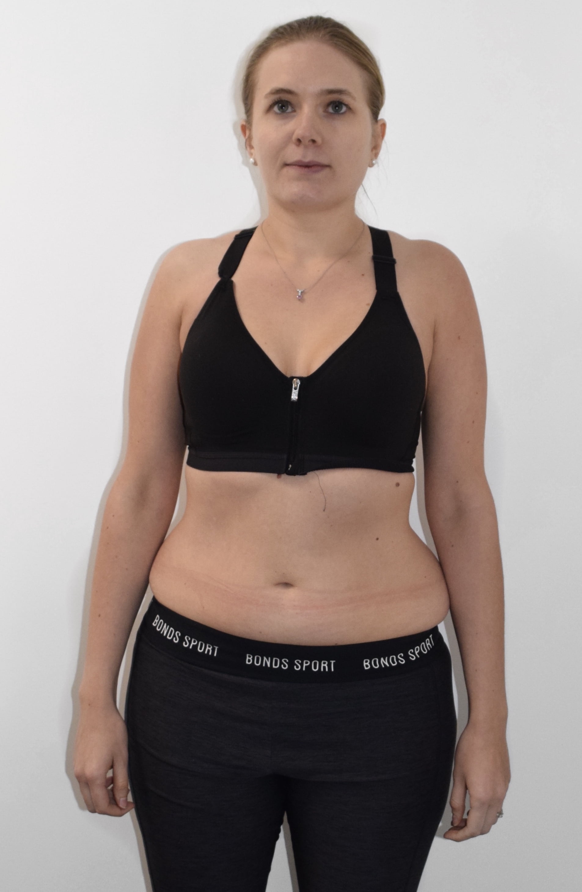 Female after photo showing body transformation results at Roar Fitness London