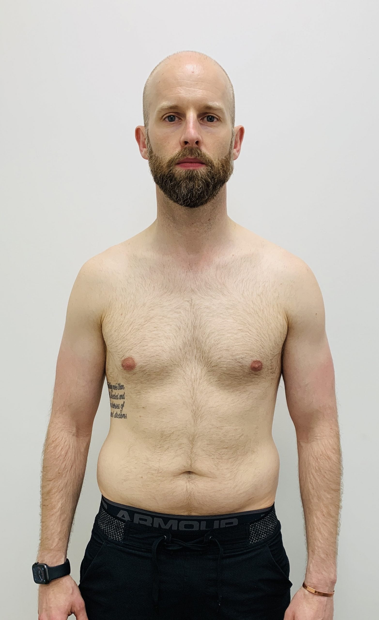 Male client lean physique from body transformation Roar Fitness