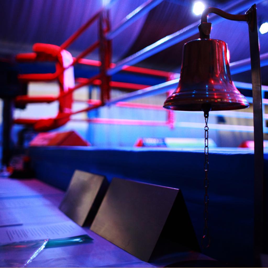 Bell beside a boxing ring, lead image of Sarah Lindsay's Entrepreneur Middle East article